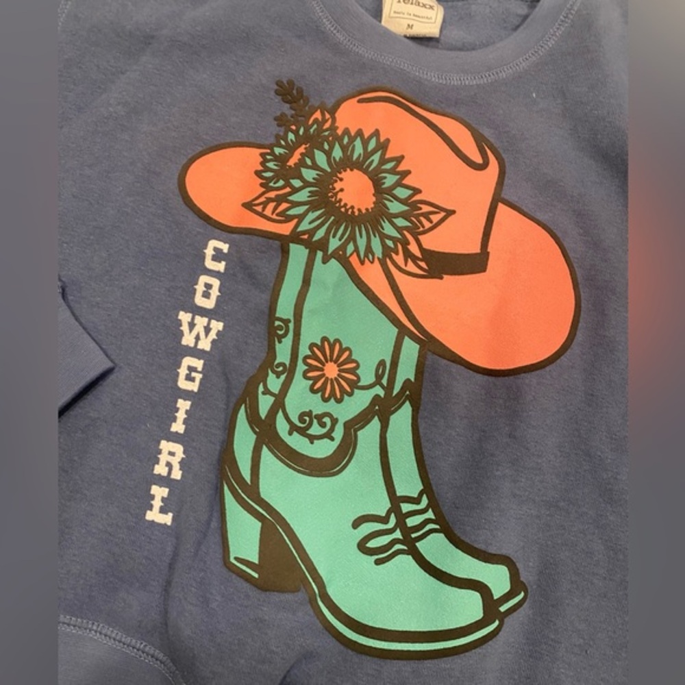 Calling all COWGIRLS🤠 festival tickets are on sale &so it this FUN sweatshirt!